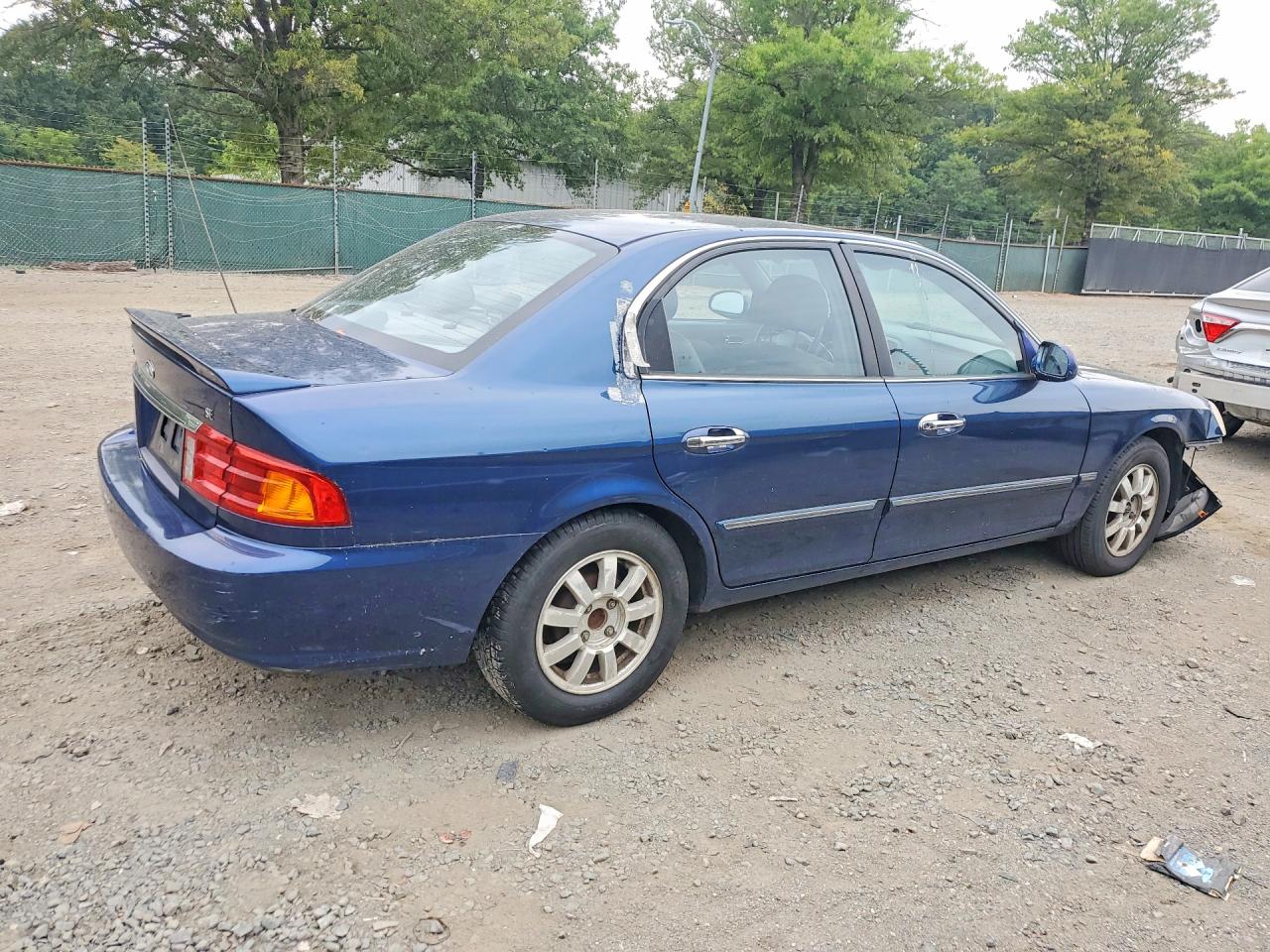 KNAGD126025169075 · 2002 KIA OPTIMA · 3/12