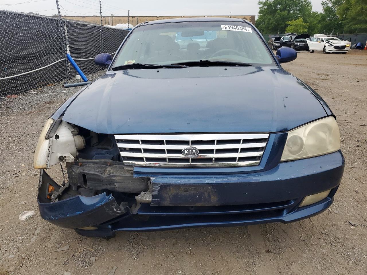 KNAGD126025169075 · 2002 KIA OPTIMA · 5/12