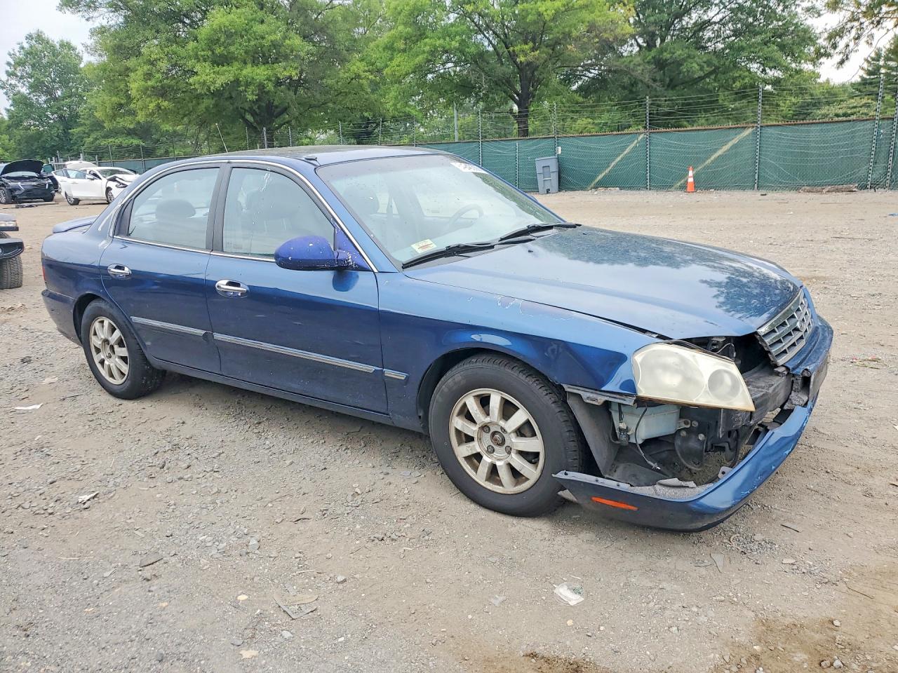 KNAGD126025169075 · 2002 KIA OPTIMA · 4/12