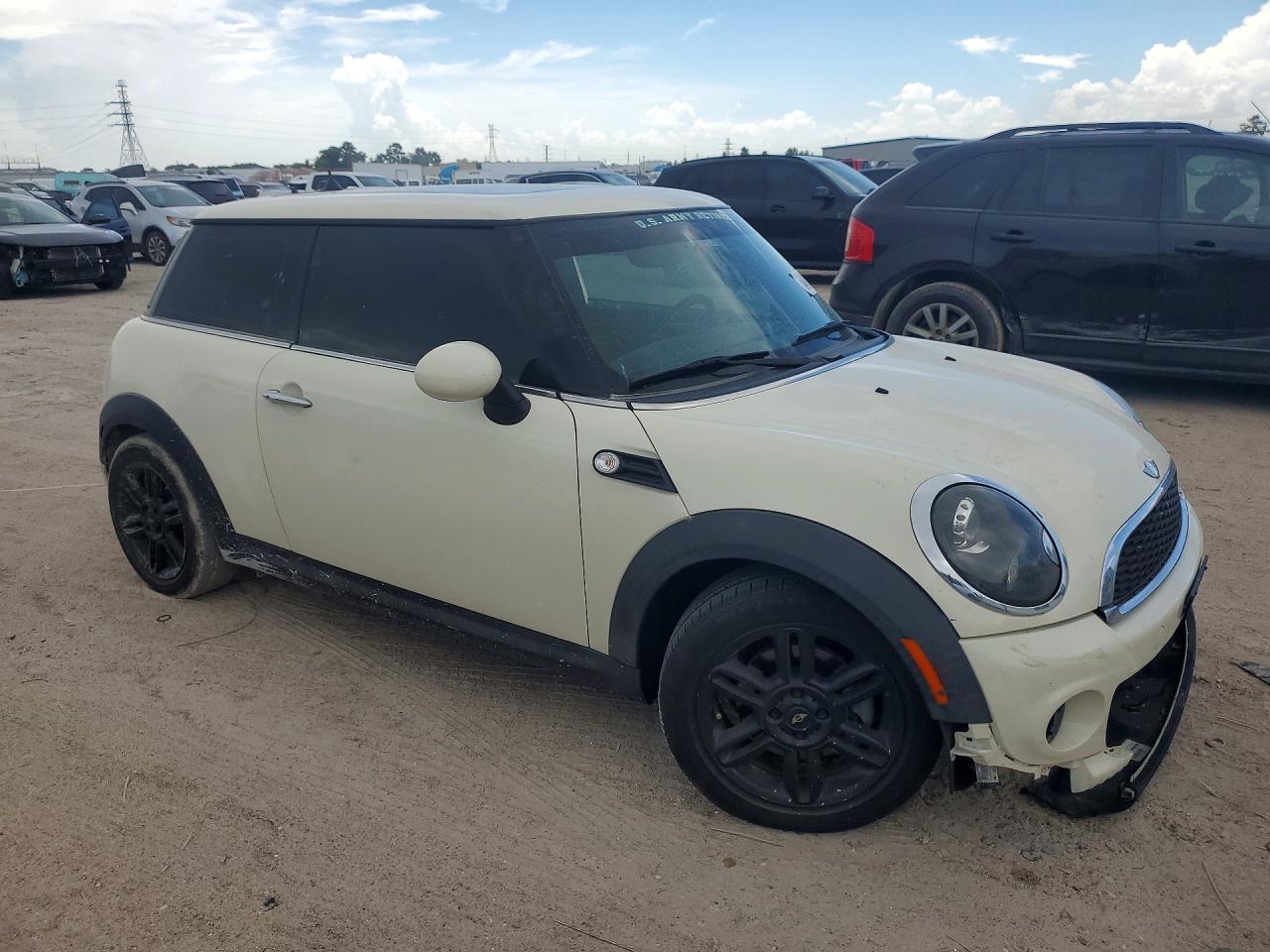WMWSU3C57CT186092 · 2012 MINI COOPER · 4/11