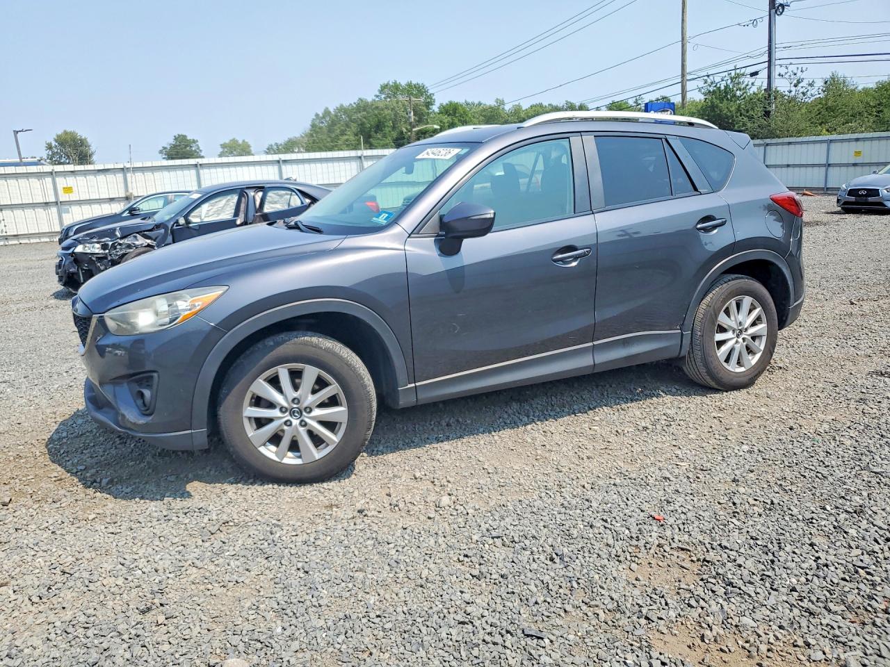 JM3KE4CY4F0505106 · 2015 MAZDA CX-5