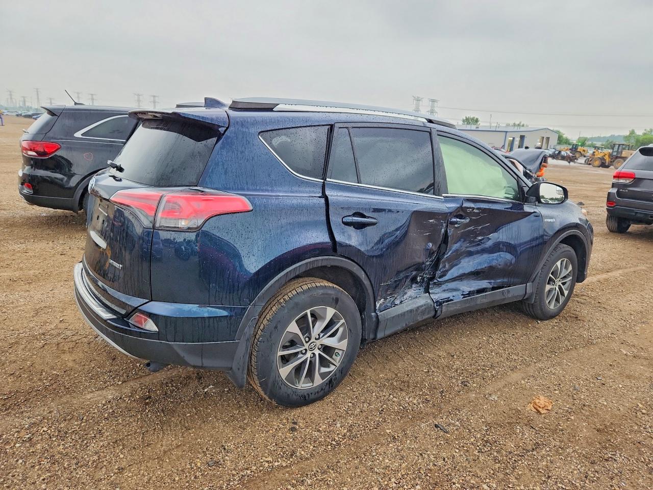 JTMRJREVXJD230619 · 2018 TOYOTA RAV4 HYBRID · 3/12