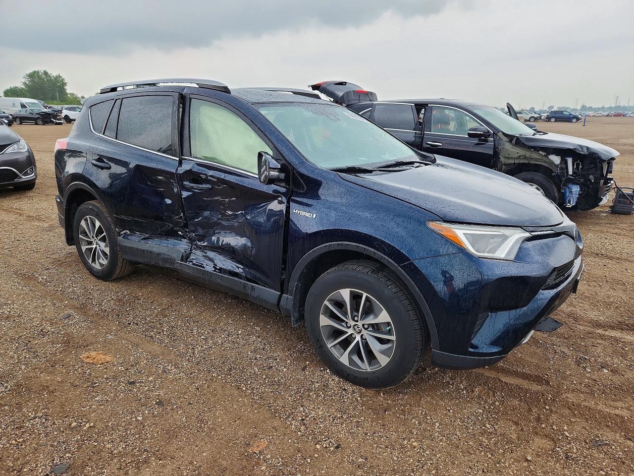 JTMRJREVXJD230619 · 2018 TOYOTA RAV4 HYBRID · 4/12