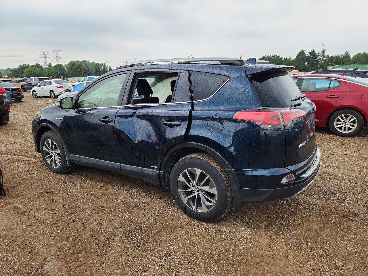 JTMRJREVXJD230619 · 2018 TOYOTA RAV4 HYBRID · 2/12