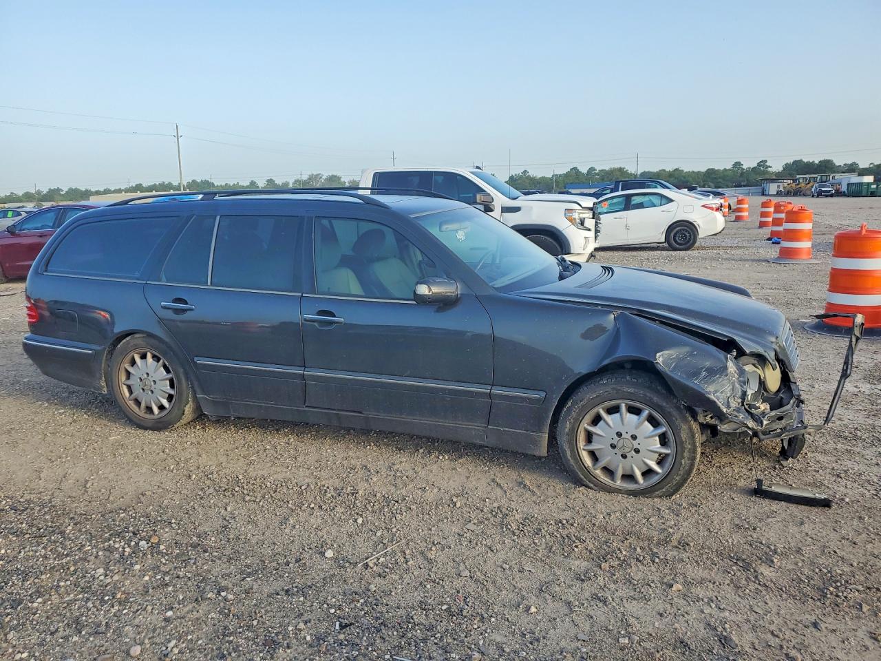 WDBJH65J92X080618 · 2002 MERCEDES-BENZ E · 4/12