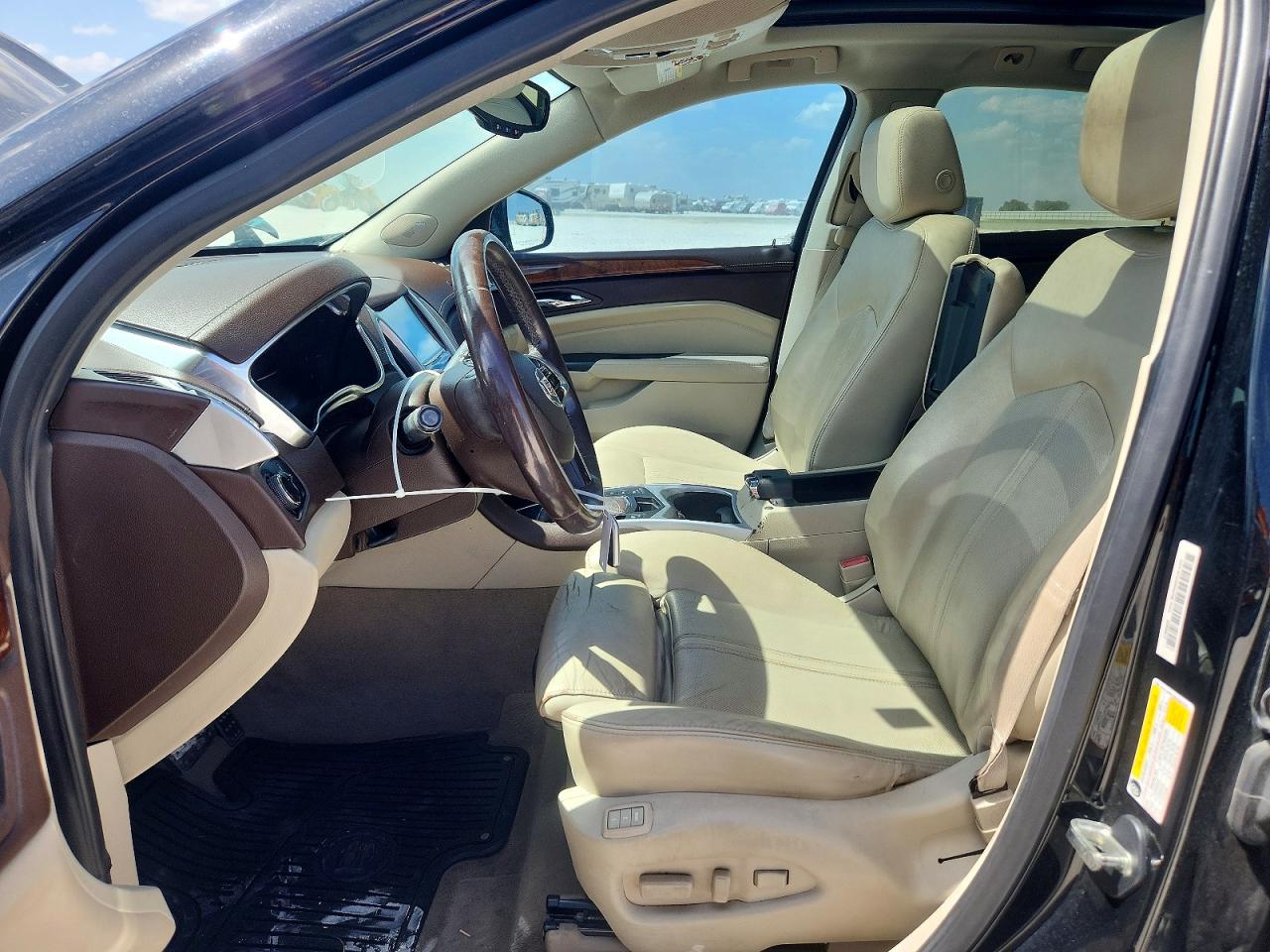 3GYFNBE39GS587645 · 2016 CADILLAC SRX · 7/12