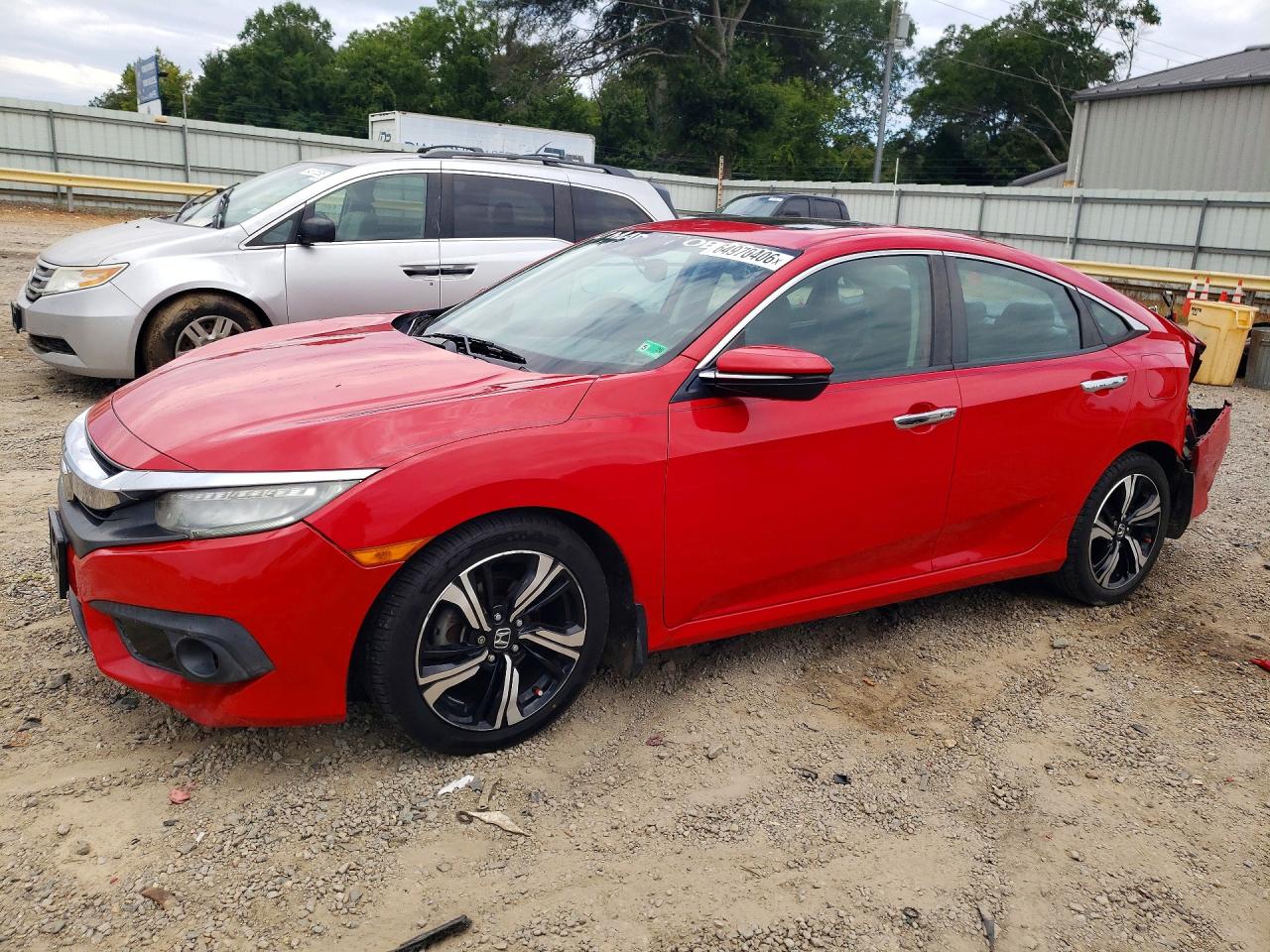 2HGFC1F97GH630988 · 2016 HONDA CIVIC