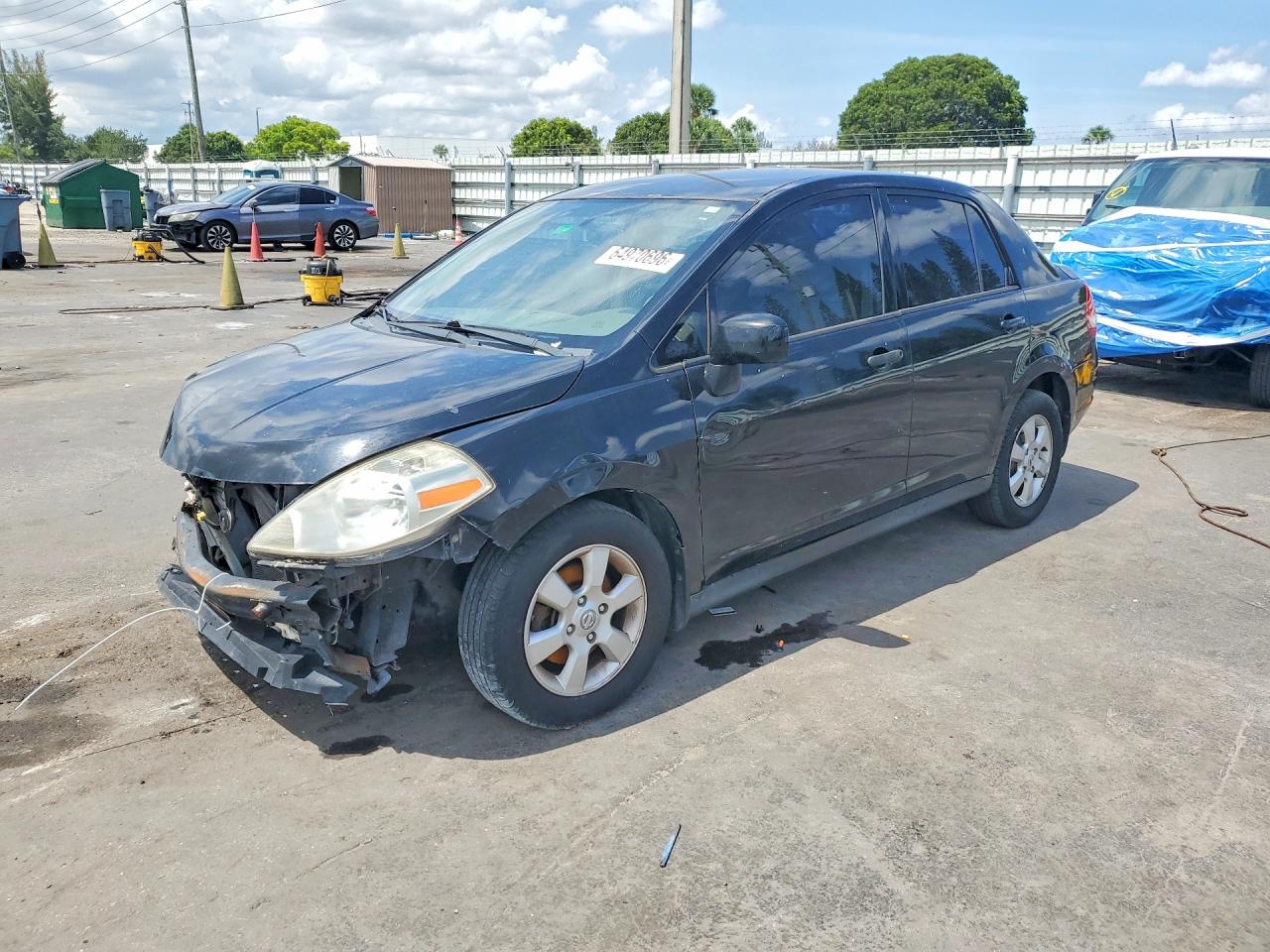3N1BC11E99L439703 · 2009 NISSAN VERSA
