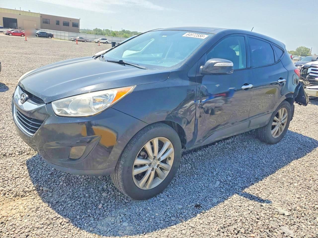 KM8JUCAC4BU294562 · 2011 HYUNDAI TUCSON