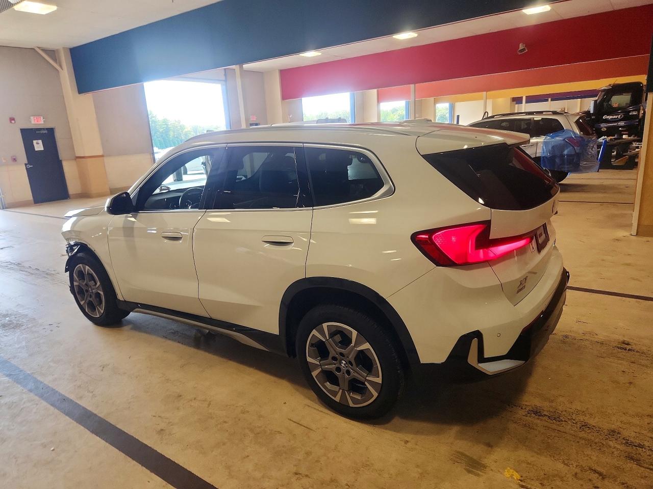 WBX73EF08P5X81165 · 2023 BMW X1 · 2/13
