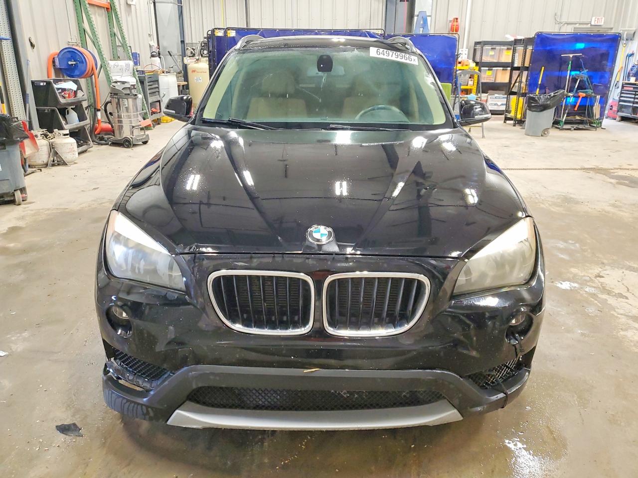 WBAVL1C52EVY10991 · 2014 BMW X1 · 5/13