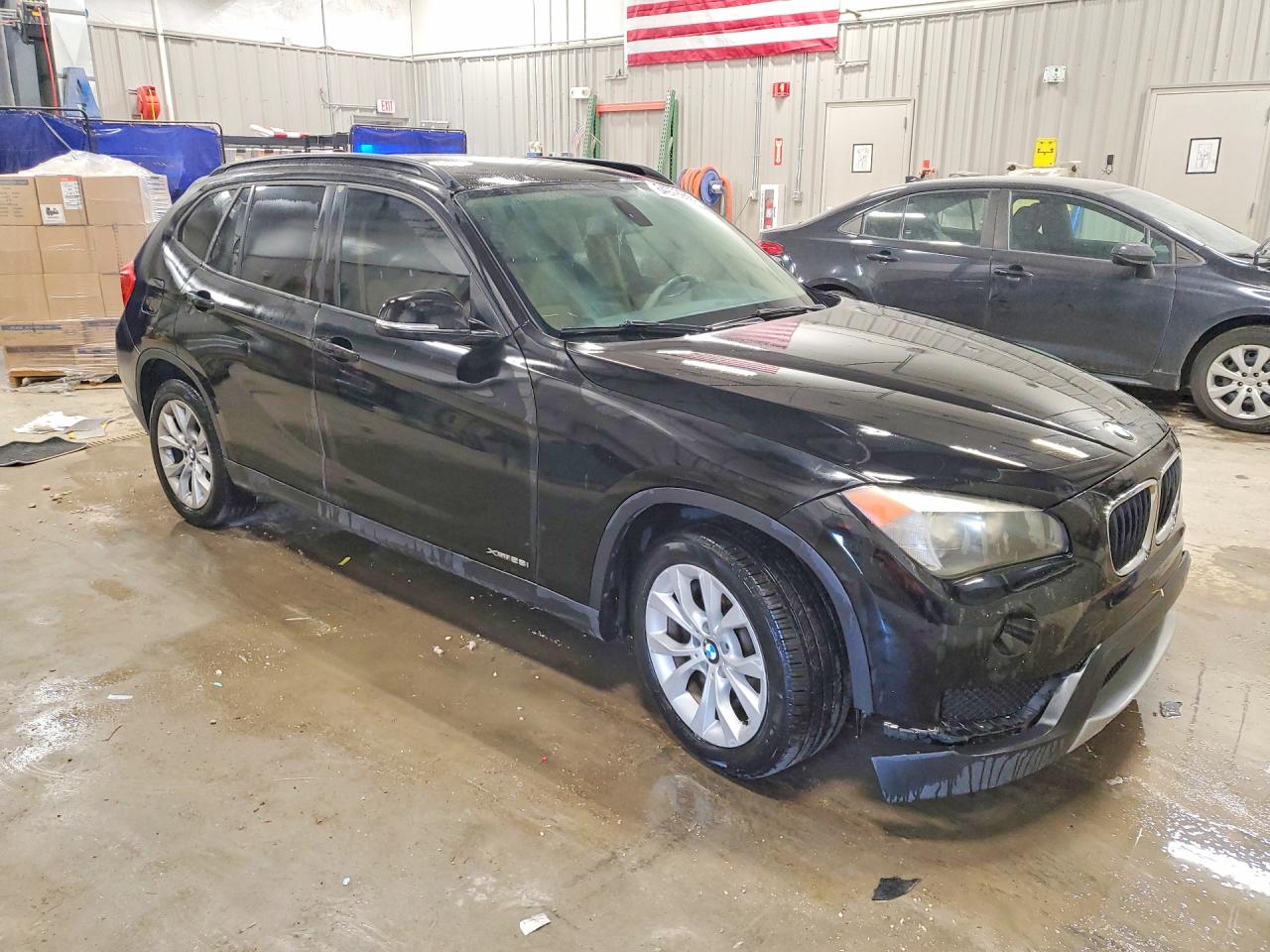 WBAVL1C52EVY10991 · 2014 BMW X1 · 4/13