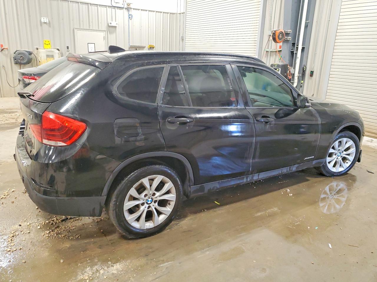 WBAVL1C52EVY10991 · 2014 BMW X1 · 3/13
