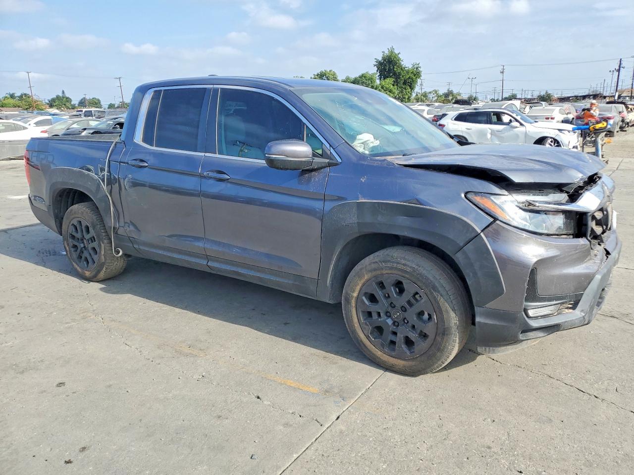 5FPYK3F54PB039730 · 2023 HONDA RIDGELINE · 4/12