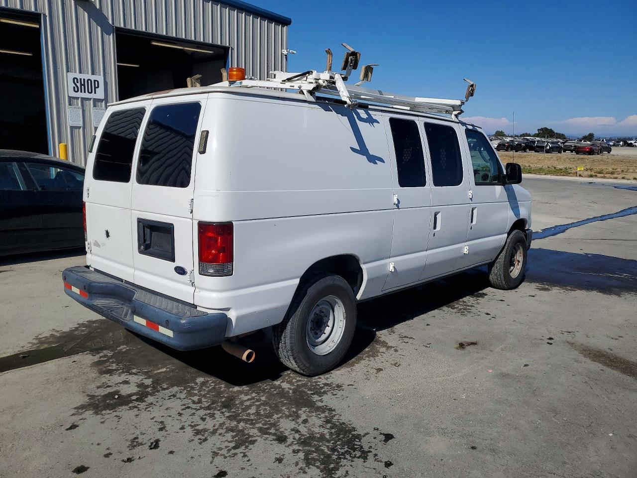 1FTNE2EL0BDB37098 · 2011 FORD ECONOLINE · 3/14