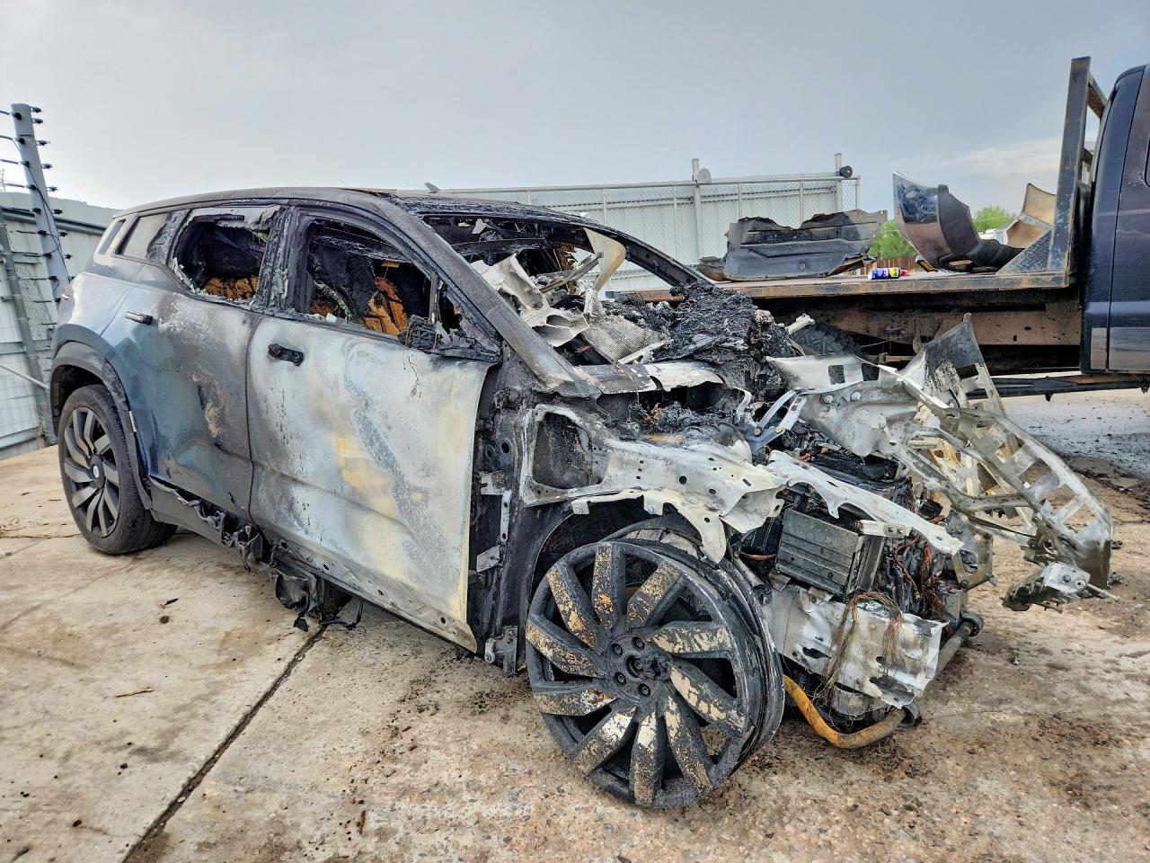 VCF1ZBU25PG003530 · 2023 FISKER INC. OCEAN · 4/12