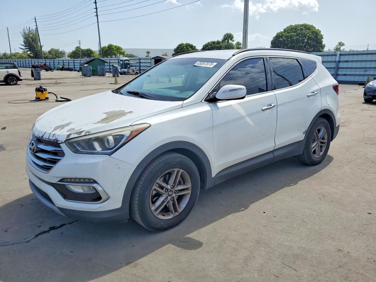 5NMZU3LB9JH100562 · 2018 HYUNDAI SANTA FE SPORT
