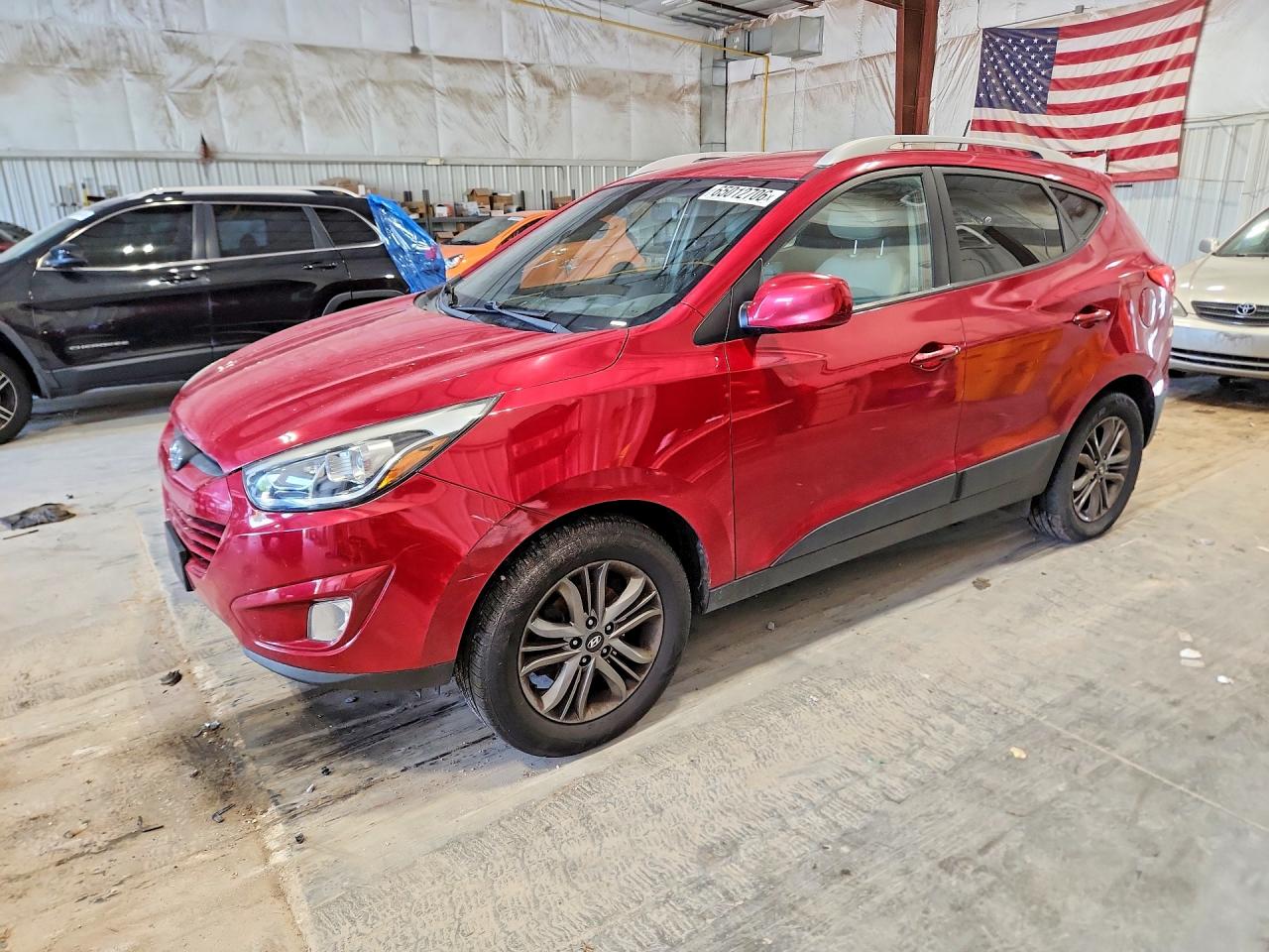 KM8JUCAGXEU934121 · 2014 HYUNDAI TUCSON