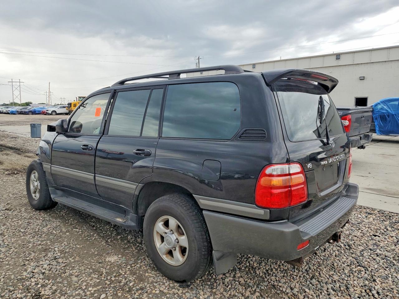 JT3HT05J6X0055689 · 1999 TOYOTA LAND CRUISER · 2/12