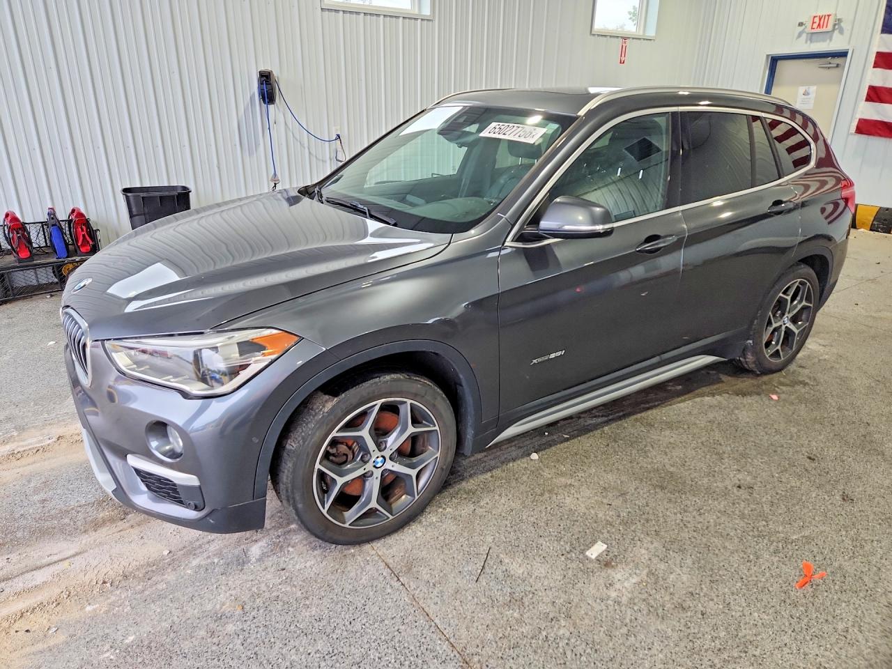 WBXHT3C31G5E47182 · 2016 BMW X1