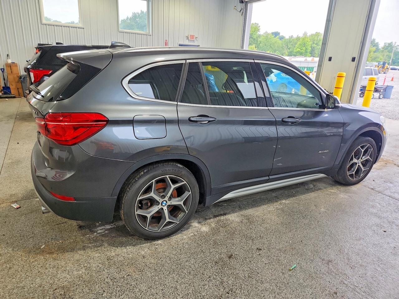WBXHT3C31G5E47182 · 2016 BMW X1 · 3/13
