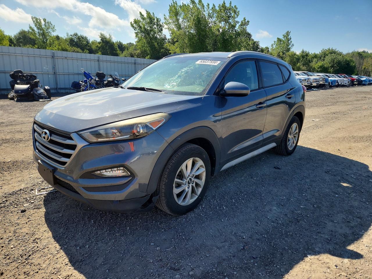KM8J3CA4XJU651785 · 2018 HYUNDAI TUCSON
