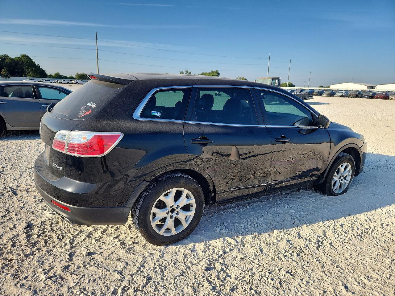 JM3TB2BA1B0329504 · 2011 MAZDA CX-9 · 3/12