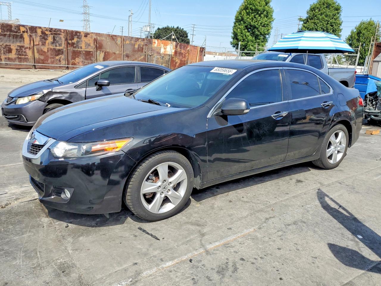 JH4CU26629C034671 · 2009 ACURA TSX
