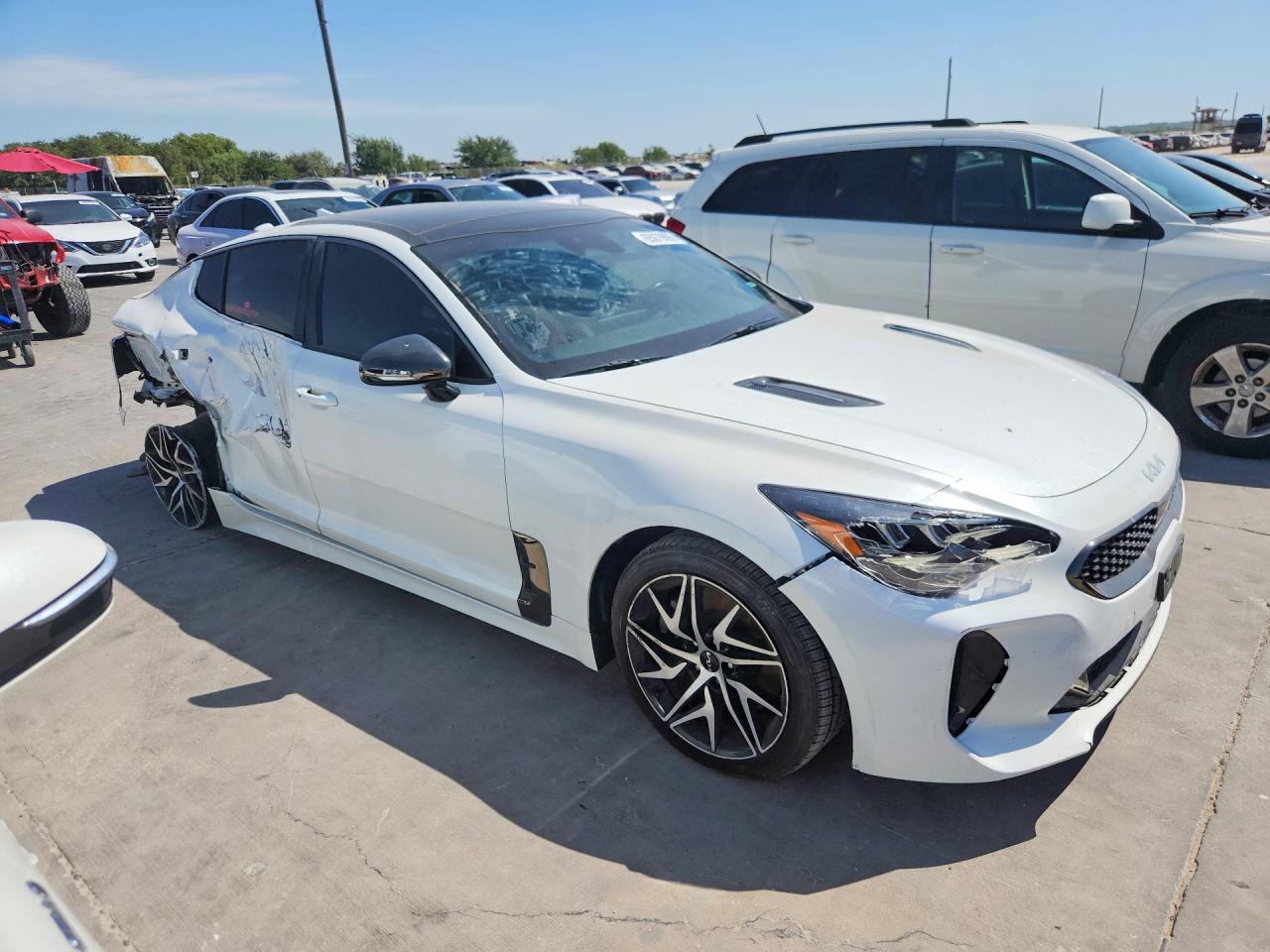 KNAE35LD9P6131084 · 2023 KIA STINGER · 4/13