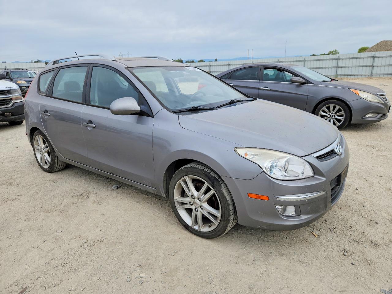 KMHDC8AE5BU101141 · 2011 HYUNDAI ELANTRA TOURING · 4/12