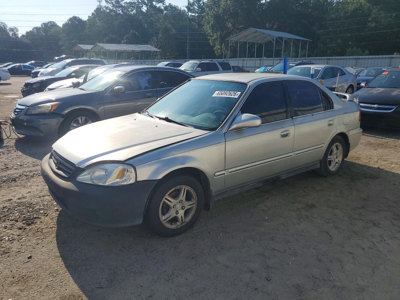 1HGEJ6672XL014454 · 1999 HONDA CIVIC