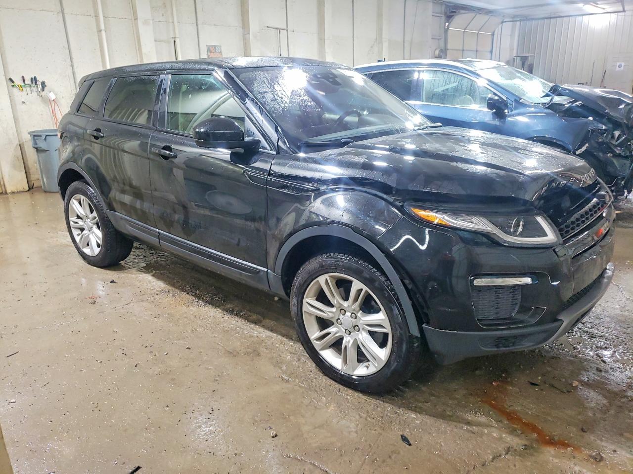 SALVP2RX0JH288515 · 2018 LAND ROVER RANGE ROVER EVOQUE · 4/14
