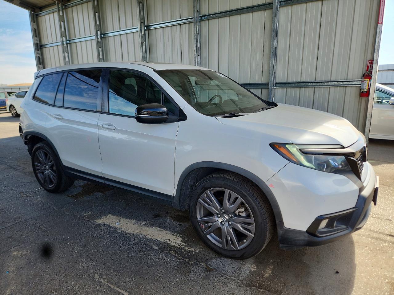 5FNYF7H54LB006433 · 2020 HONDA PASSPORT · 4/14