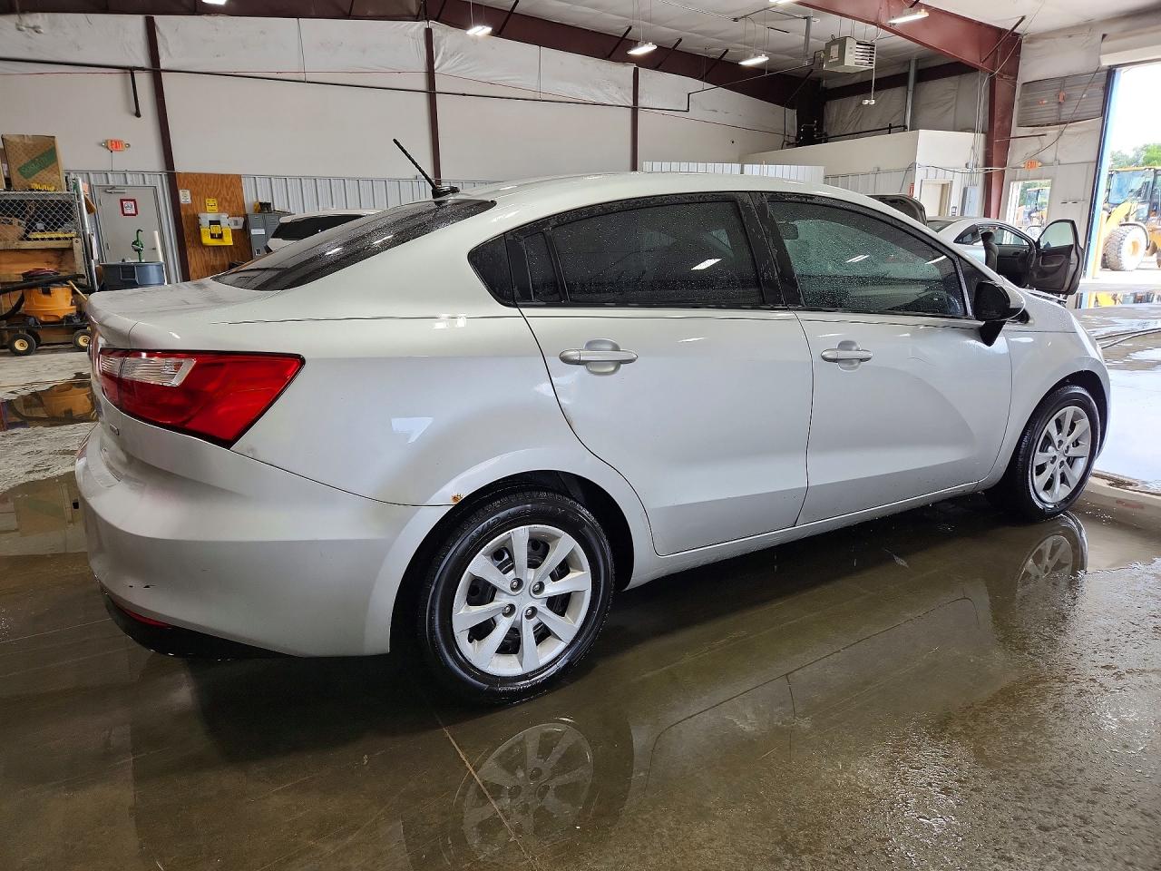 KNADM4A32H6028670 · 2017 KIA RIO · 3/13