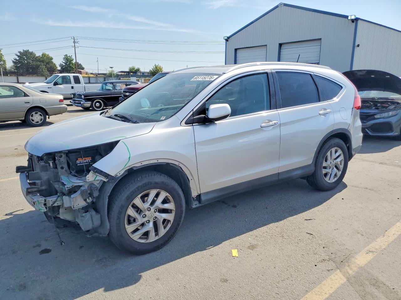 2HKRM4H76FH617368 · 2015 HONDA CR-V