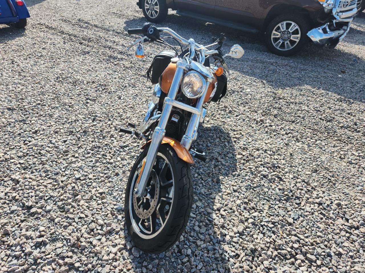 1HD1GNM2XEC327633 · 2014 HARLEY-DAVIDSON FXDL · 2/9