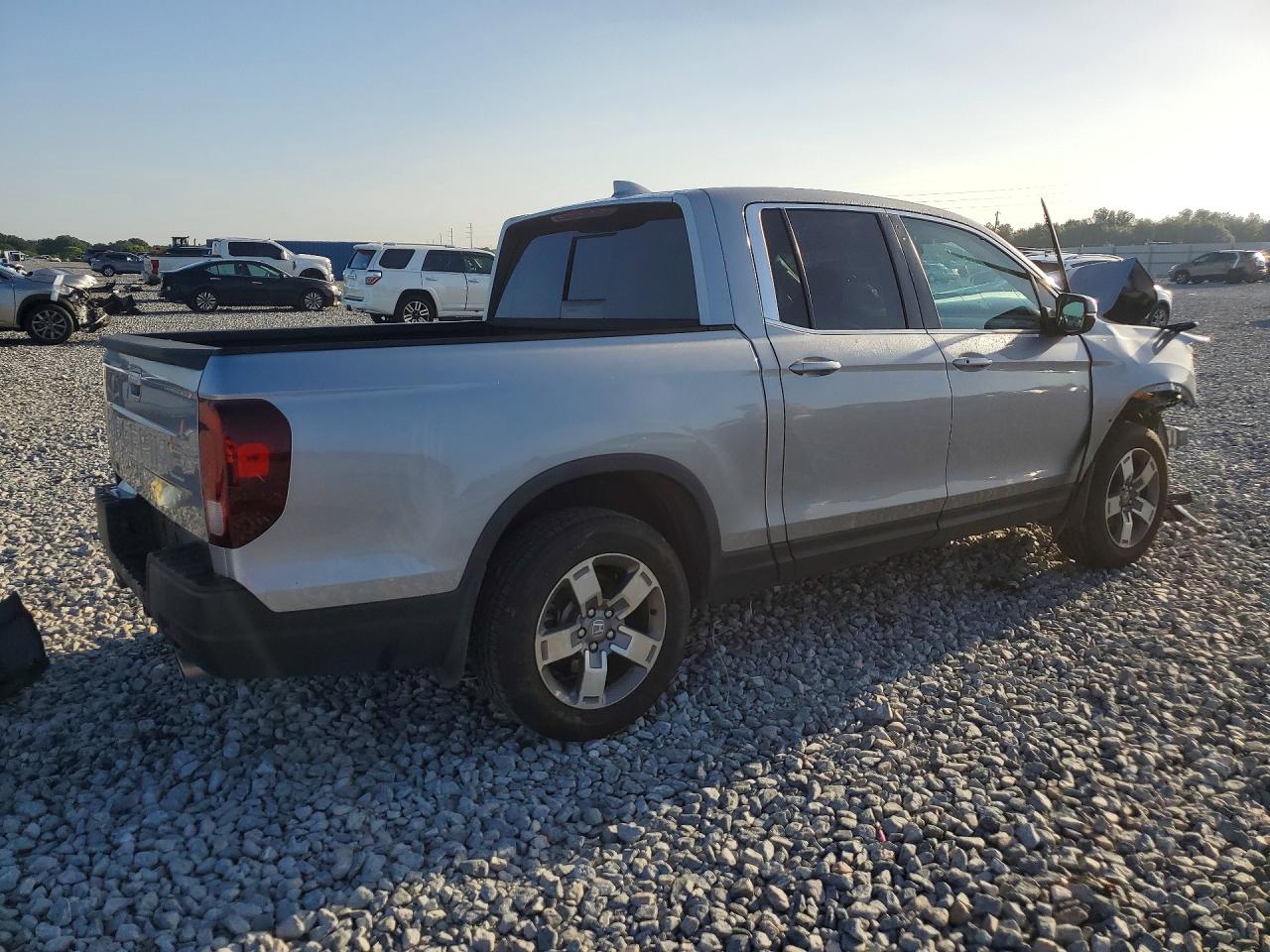 5FPYK3F57RB009401 · 2024 HONDA RIDGELINE · 3/13
