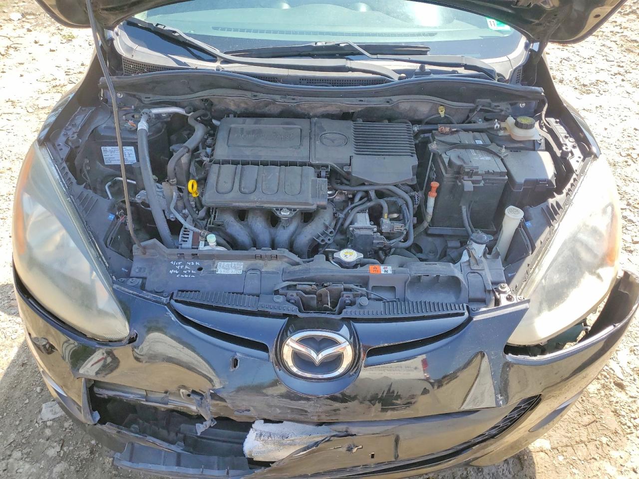 JM1DE1HY1B0126972 · 2011 MAZDA MAZDA2 · 11/12