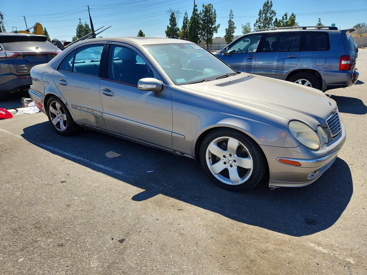 WDBUF70JX4A457317 · 2004 MERCEDES-BENZ E · 4/13