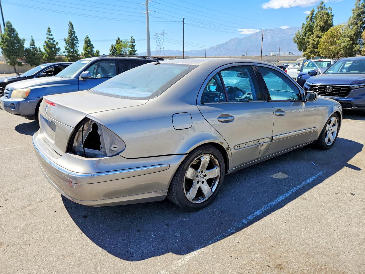 WDBUF70JX4A457317 · 2004 MERCEDES-BENZ E · 3/13