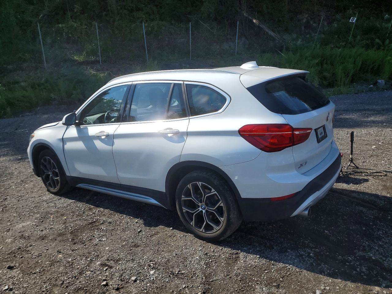 WBXJG9C04M5S32449 · 2021 BMW X1 · 2/14