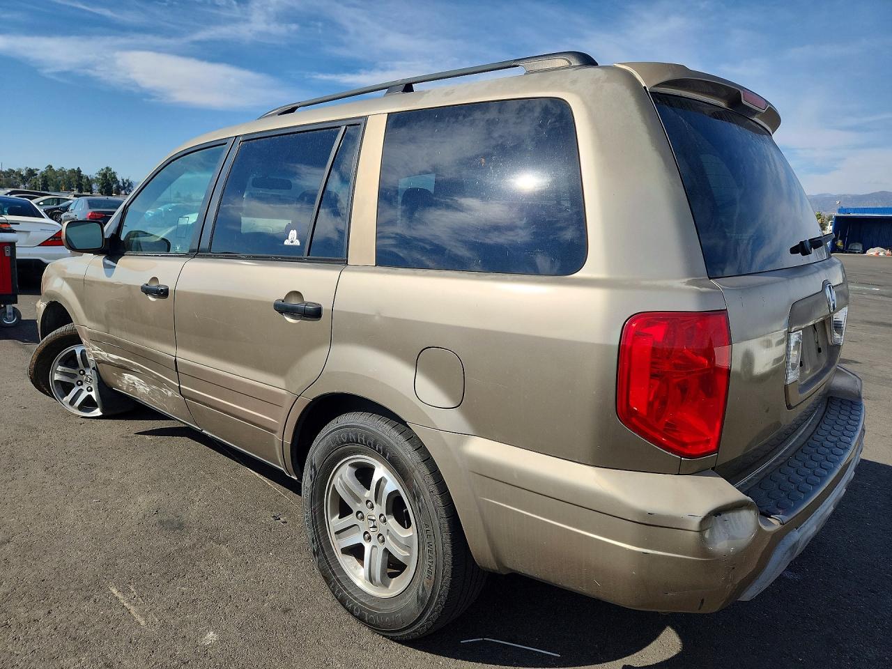 2HKYF186X3H530080 · 2003 HONDA PILOT · 2/13