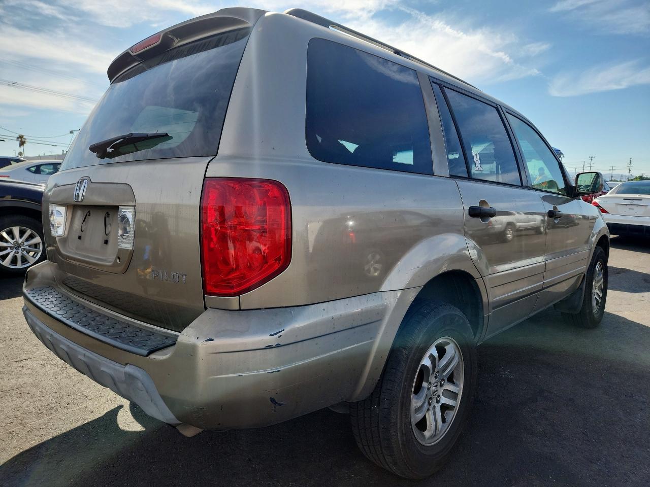 2HKYF186X3H530080 · 2003 HONDA PILOT · 3/13