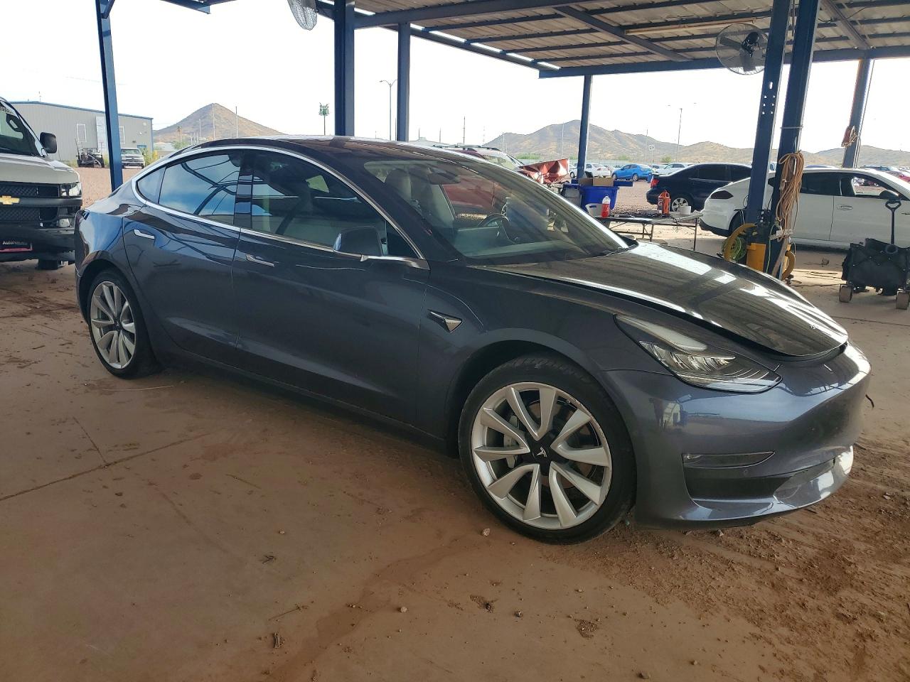 5YJ3E1EA4JF048805 · 2018 TESLA MODEL 3 · 4/12