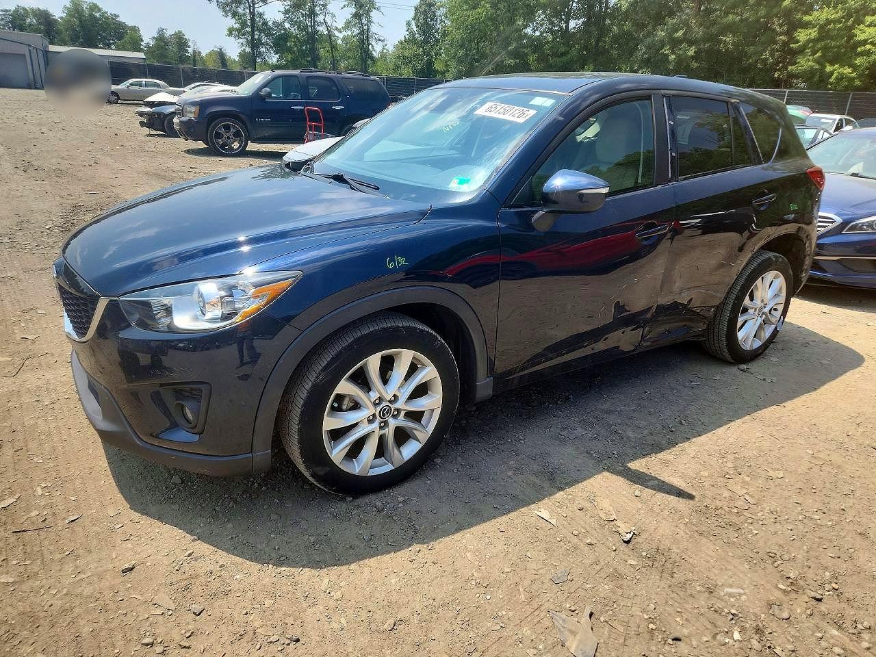 JM3KE4DY0F0551742 · 2015 MAZDA CX-5
