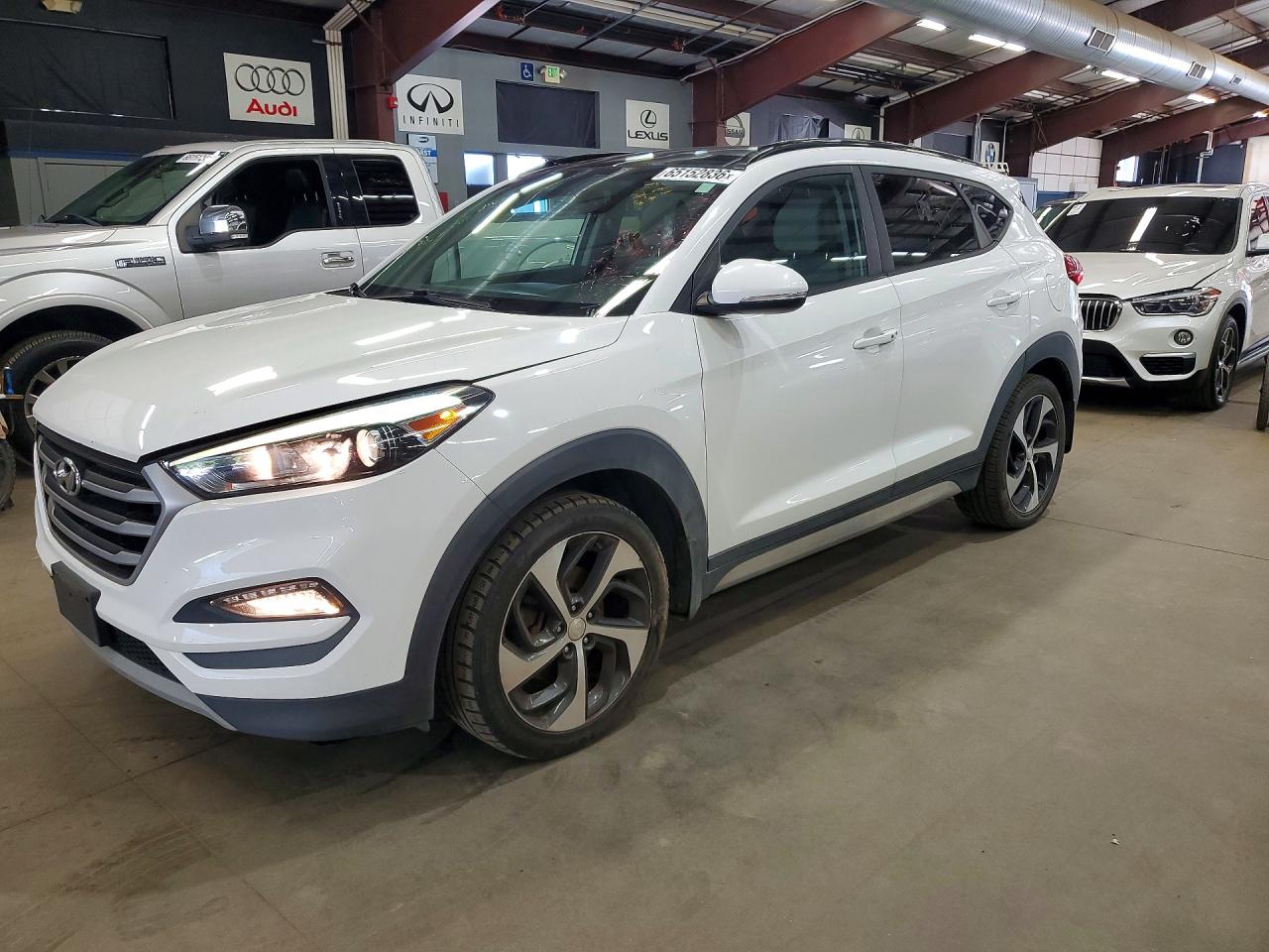 KM8J3CA23JU631571 · 2018 HYUNDAI TUCSON