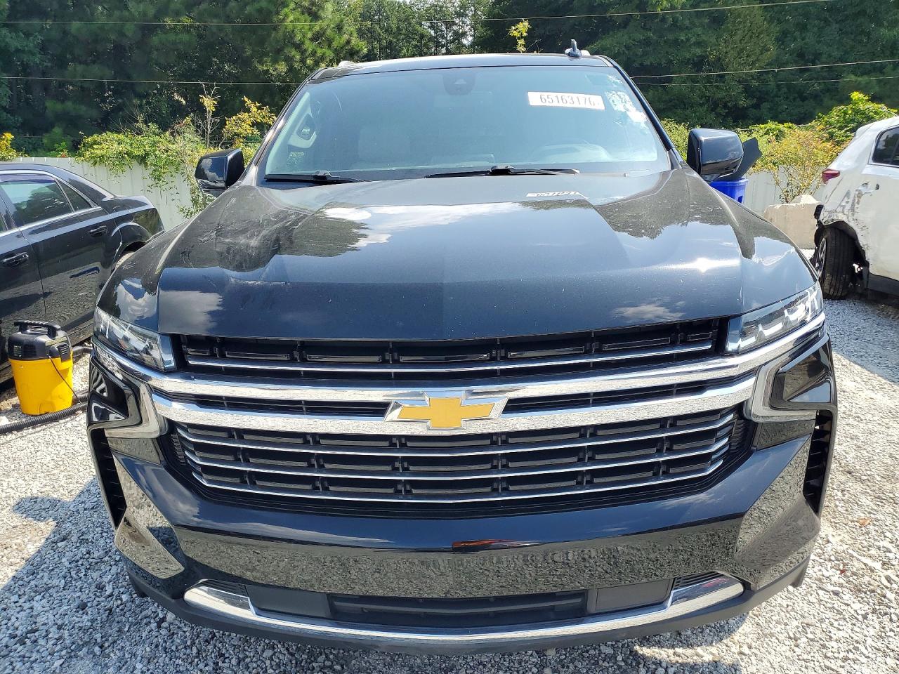 1GNSCCKD0MR195723 · 2021 CHEVROLET SUBURBAN · 5/13