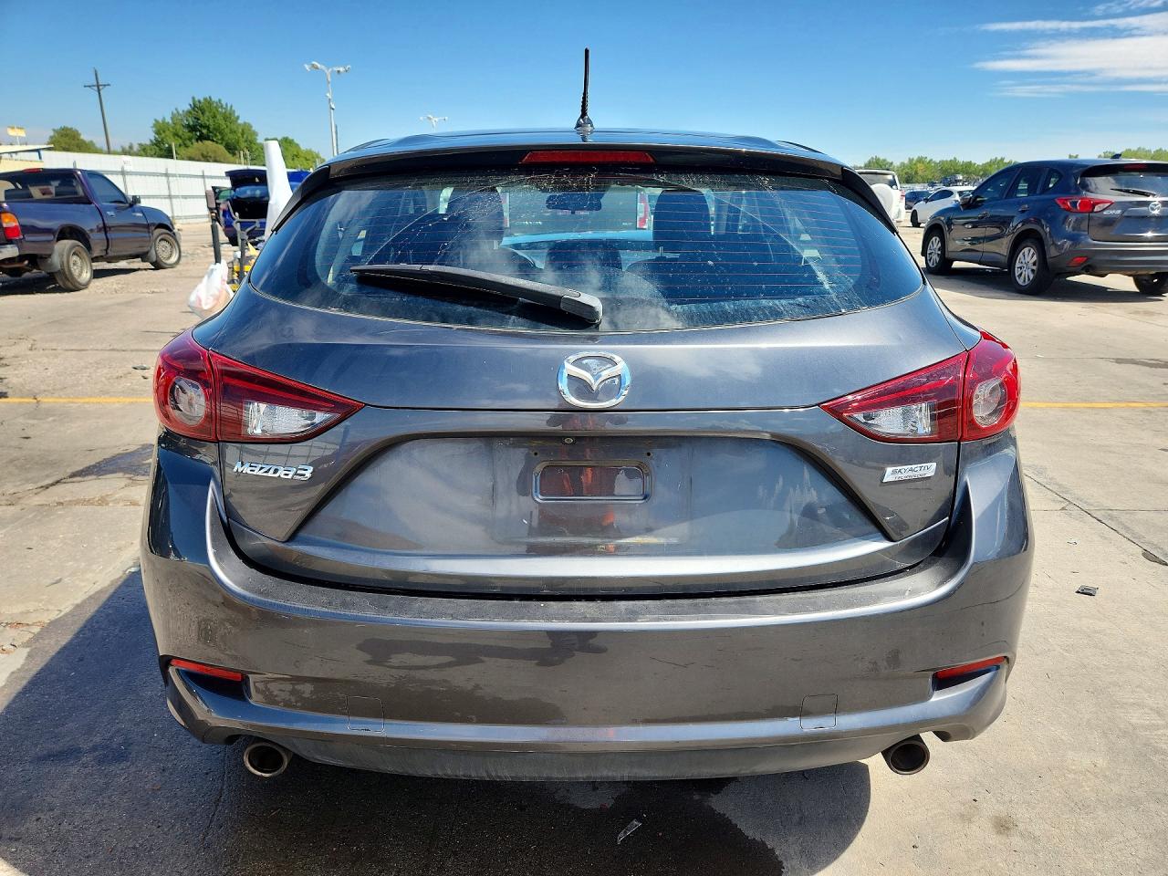 JM1BN1L32H1124024 · 2017 MAZDA 3 · 6/13
