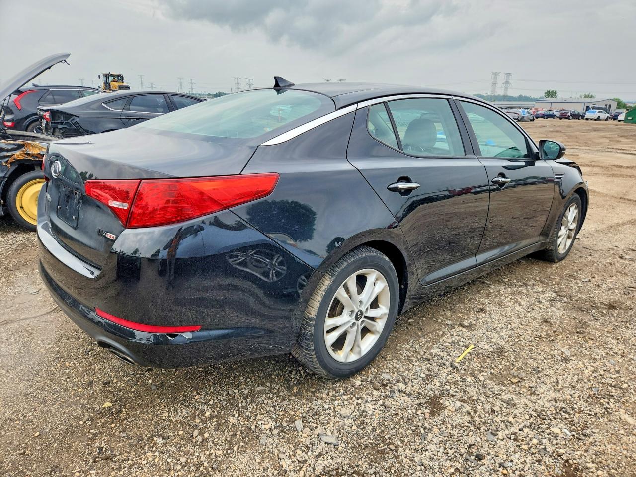 KNAGN4A72B5145000 · 2011 KIA OPTIMA · 3/12