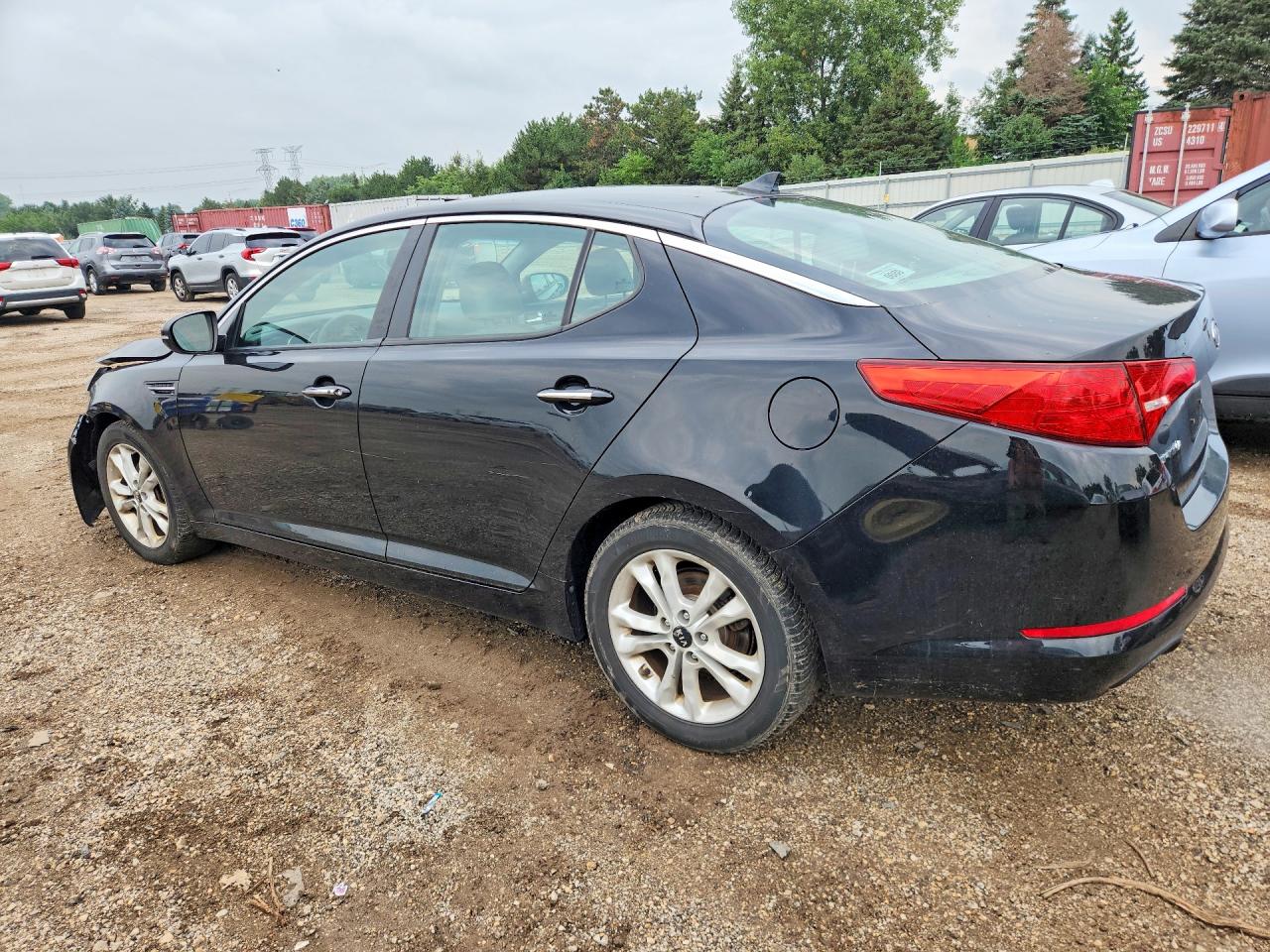 KNAGN4A72B5145000 · 2011 KIA OPTIMA · 2/12